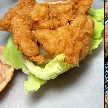 Golden fried pieces served on lettuce in a bun.